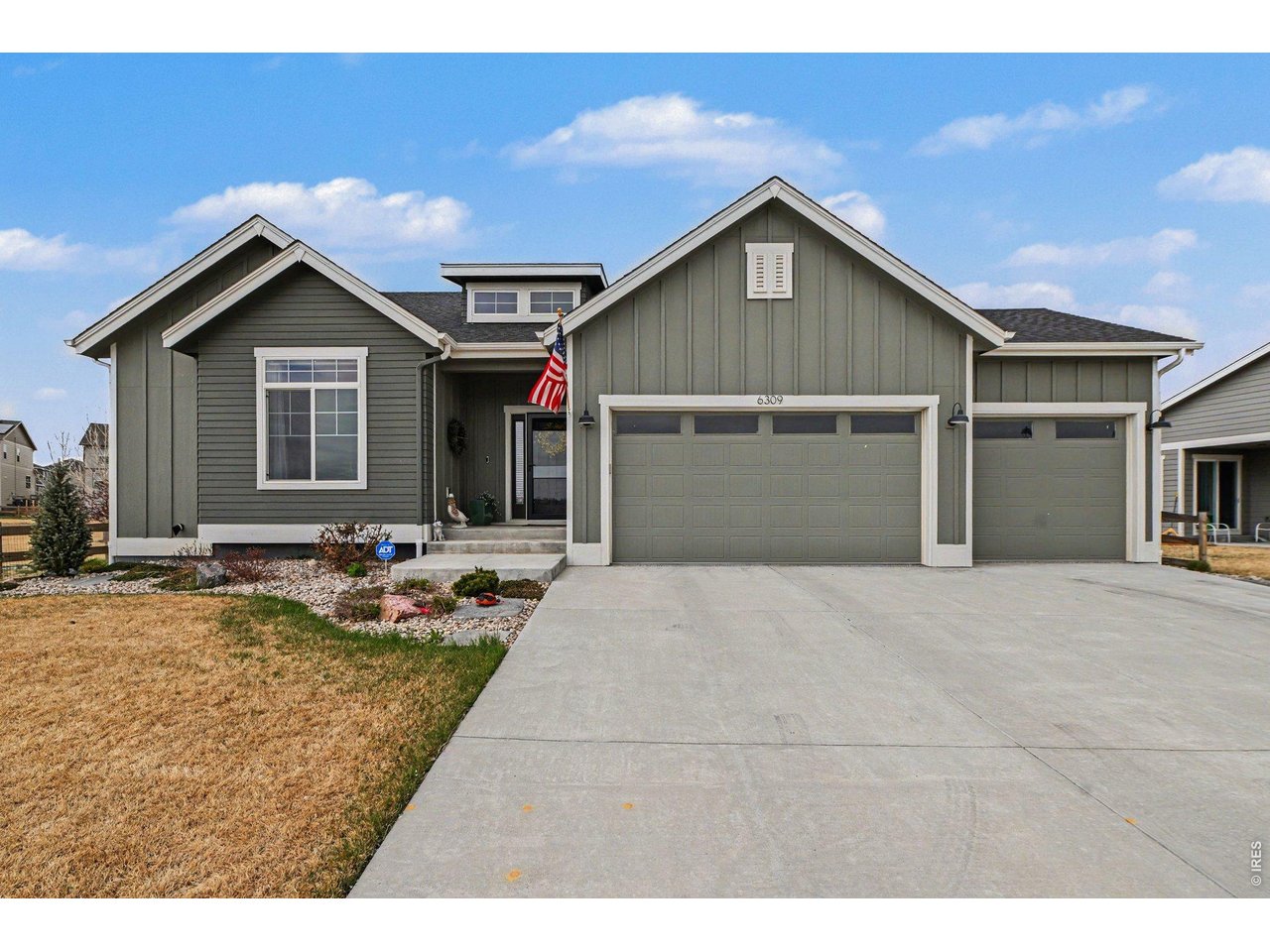 6309 2nd Street Greeley, CO 80634 - Photo 33 of 33 a front view of house with garage and yard