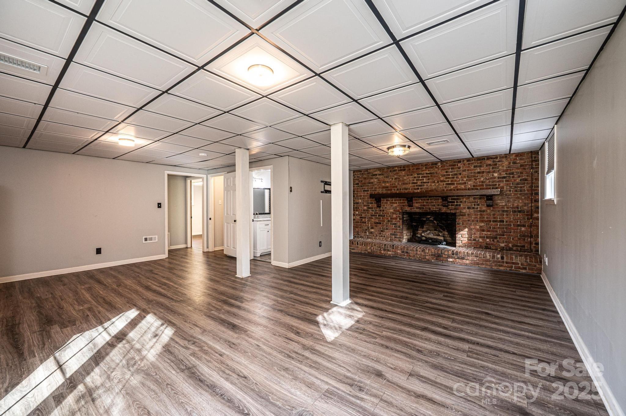 710 4th Avenue Northeast Conover, NC 28613 - Photo 20 of 33 a view of empty room with wooden floor
