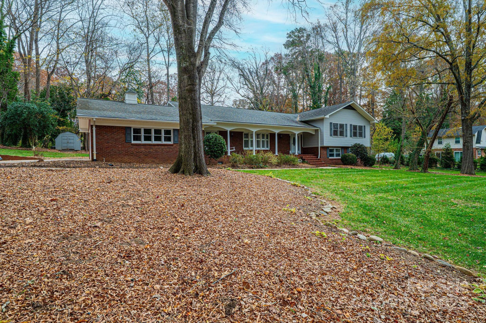 710 4th Avenue Northeast Conover, NC 28613 - Photo 2 of 33 a front view of a house with garden