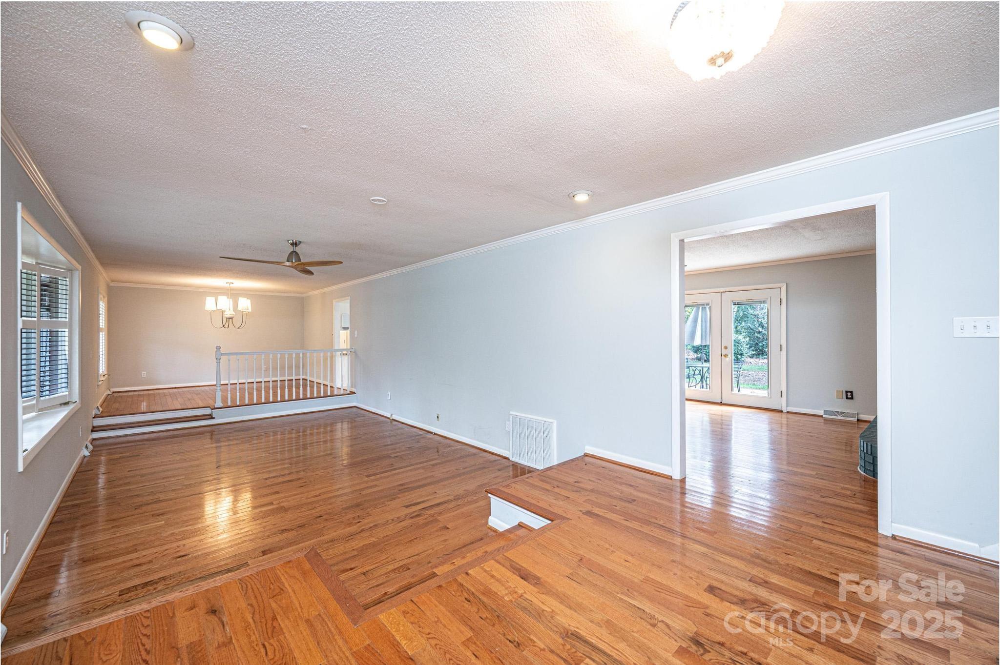 710 4th Avenue Northeast Conover, NC 28613 - Photo 5 of 33 a view of empty room with wooden floor