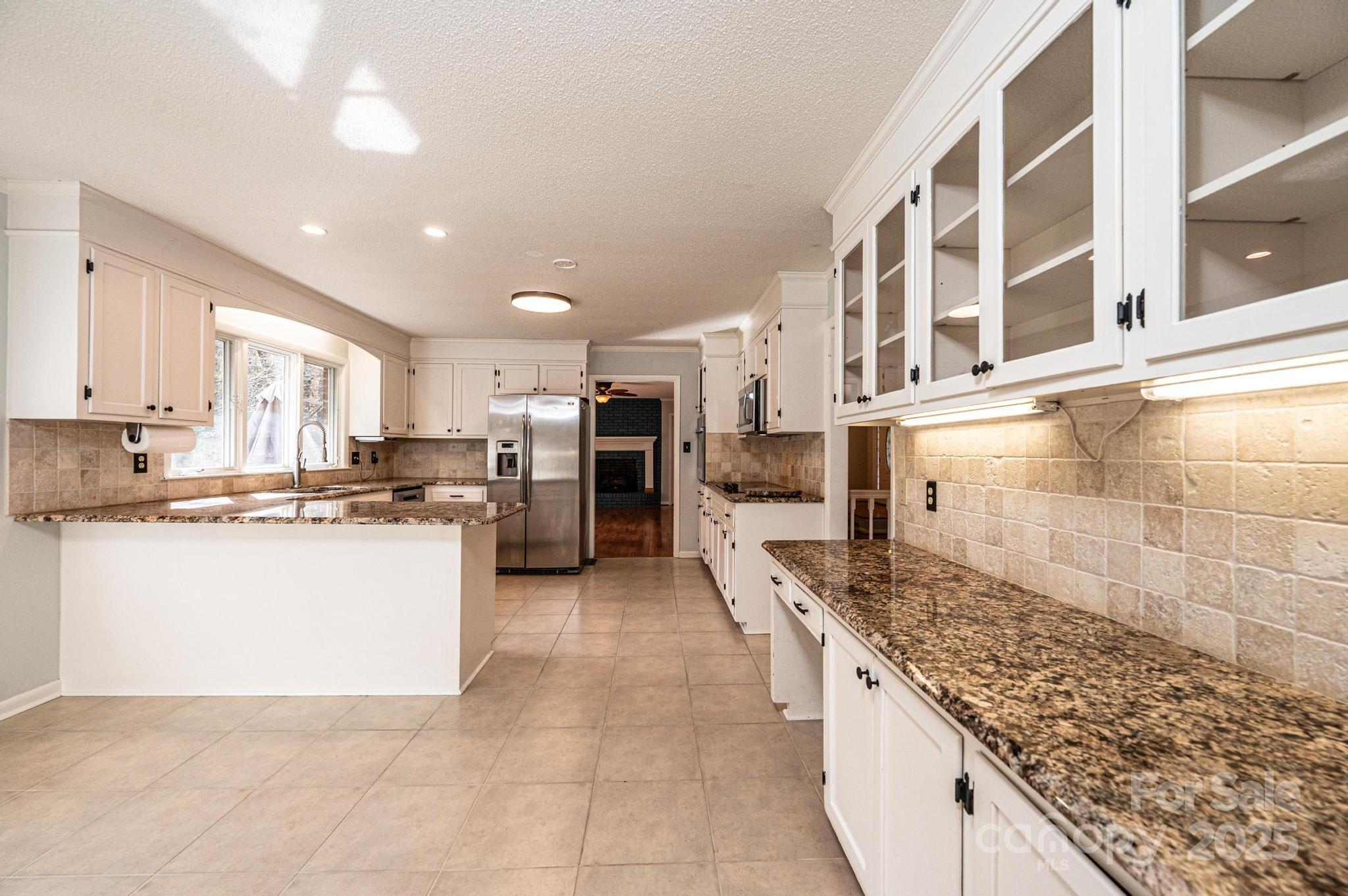 710 4th Avenue Northeast Conover, NC 28613 - Photo 7 of 33 a kitchen with a sink and cabinets