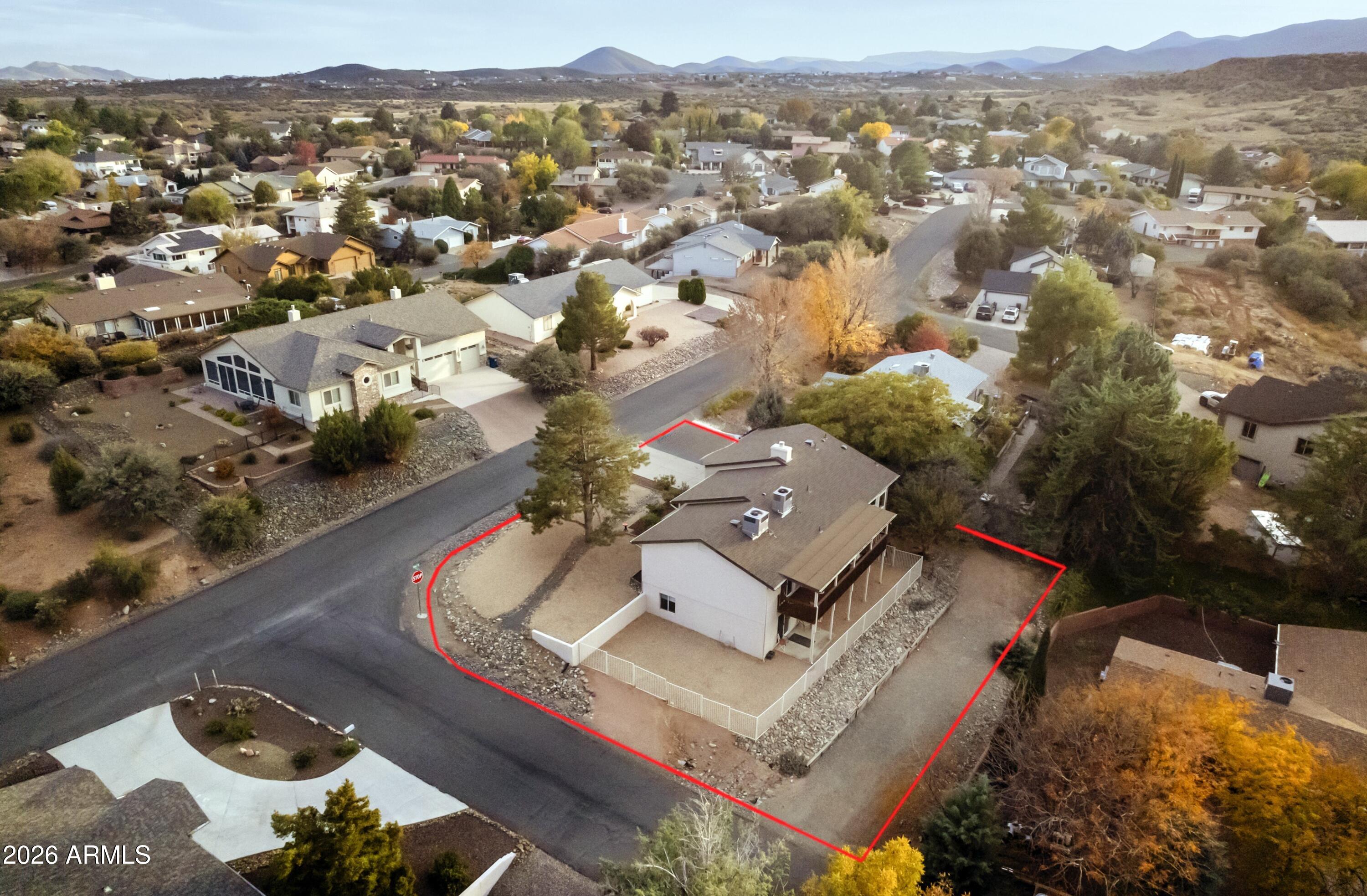 11160 Pima Road Dewey, AZ 86327 - Photo 42 of 58 an aerial view of residential houses with outdoor space