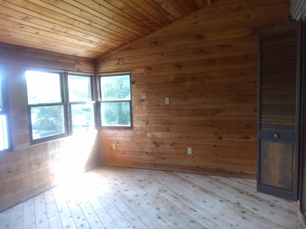 851 Federal Road Livermore, ME 04253 - Photo 26 of 47 0336 blue enclosed room view of cove