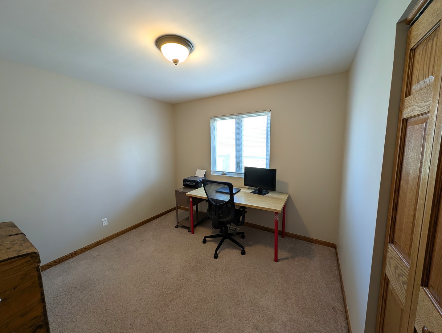 27 Winrock Road Montgomery, IL 60538 - Photo 12 of 19 a workspace with furniture and a window