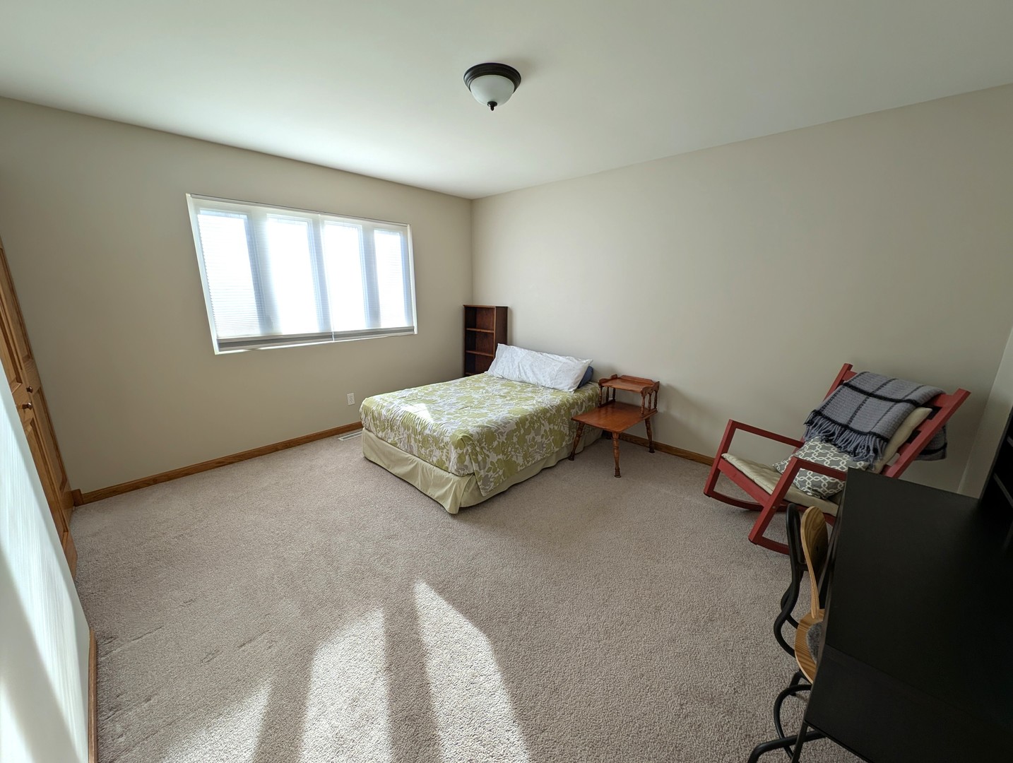 27 Winrock Road Montgomery, IL 60538 - Photo 8 of 19 a spacious bedroom with a bed and a window