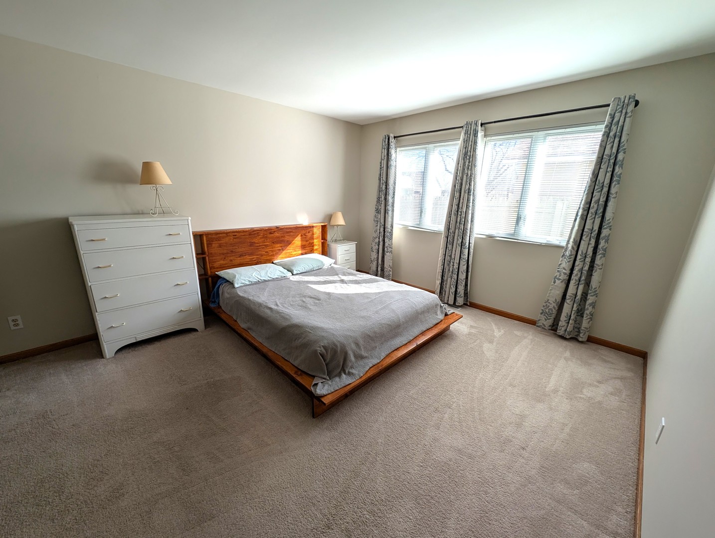 27 Winrock Road Montgomery, IL 60538 - Photo 9 of 19 a bedroom with a bed and a table