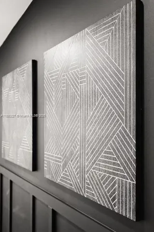 a kitchen with stainless steel appliances white cabinets and a sink