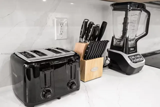 a vase of flowers sitting on a table