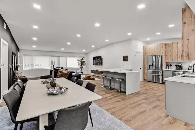 a bedroom with a bed and a chair