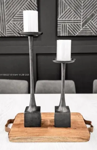 a living room with furniture and a lamp