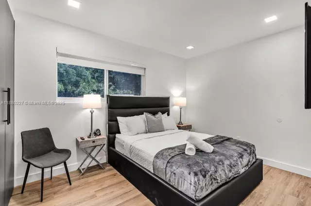 a bathroom with a sink double vanity and a mirror