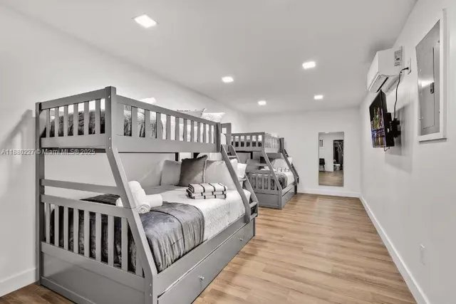 a view of swimming pool in the backyard of house