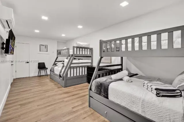 a view of backyard with swimming pool and outdoor seating