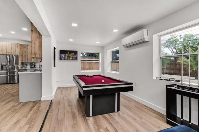 a living room with a couch and a fireplace