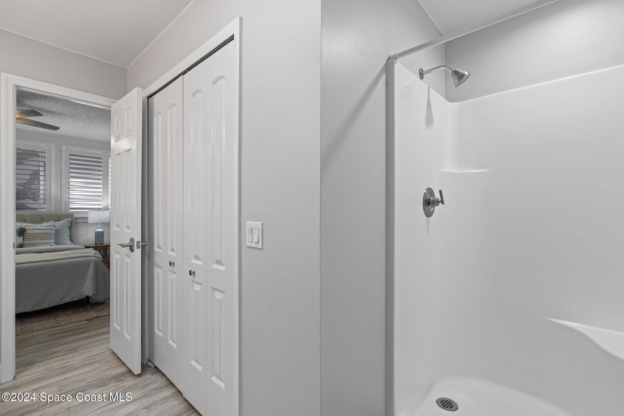 654 Cedar Side Circle Northeast Palm Bay, FL 32905 - Photo 25 of 35 a bathroom with a shower and a sink