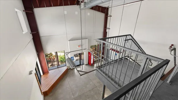 a bathroom with a sink toilet and a mirror