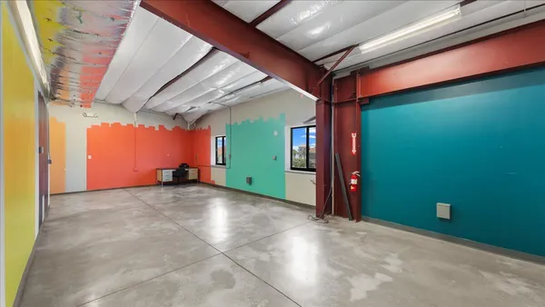 a view of store room with wooden floor