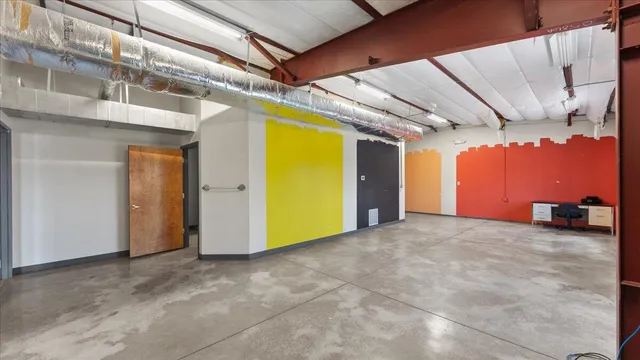 a view of a patio with swimming pool