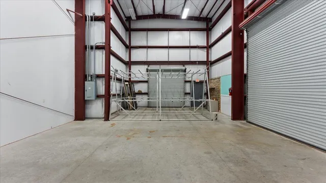 an aerial view of houses with yard