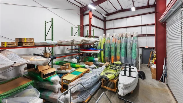 an aerial view of residential house with outdoor space and swimming pool