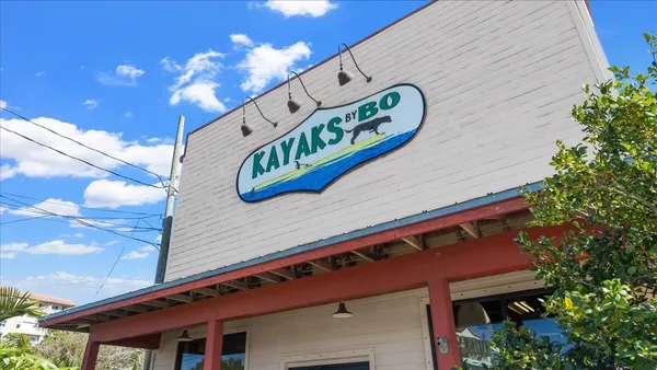 a view of car parked in front of house