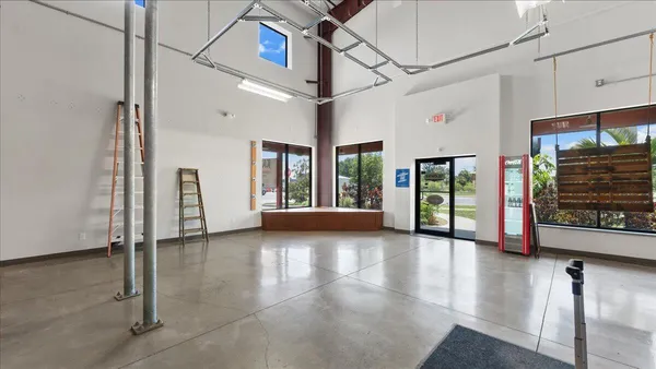 a bed sitting in front of a window