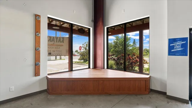 a view of walk in closet with clothes