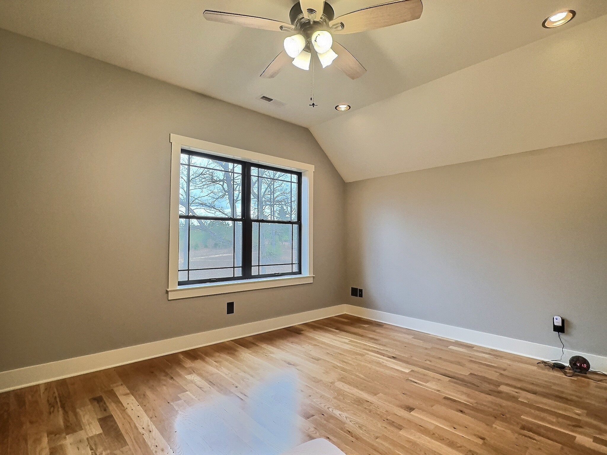 7307 Brush Creek Road Fairview, TN 37062 - Photo 13 of 41 wooden floor in an empty room with a window