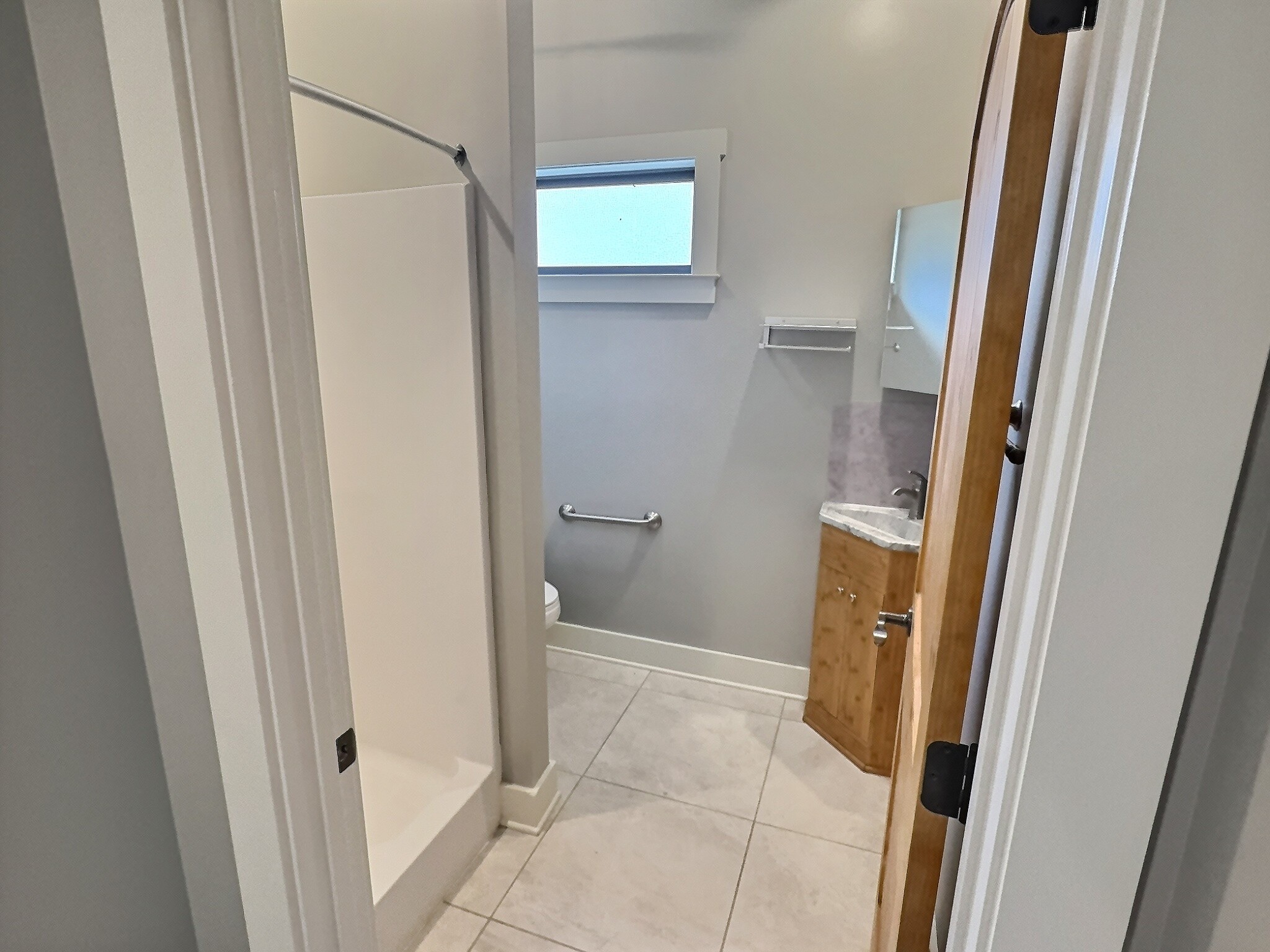 7307 Brush Creek Road Fairview, TN 37062 - Photo 15 of 41 a bathroom with a sink and a shower