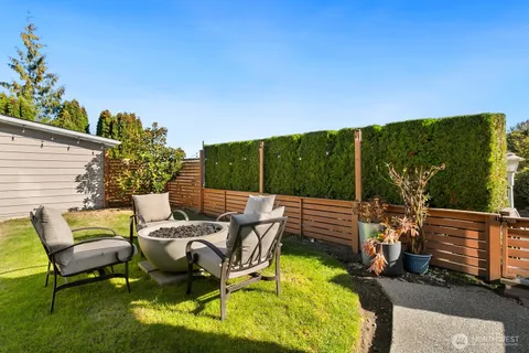 a view of a patio with chairs in patio