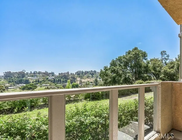 a view of a lake from a balcony