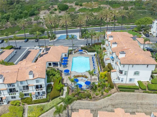 an aerial view of a house with a garden