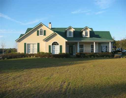 10017 Em En El Grove Road Leesburg, FL 34788 - Photo 1 of 10 Exterior Front