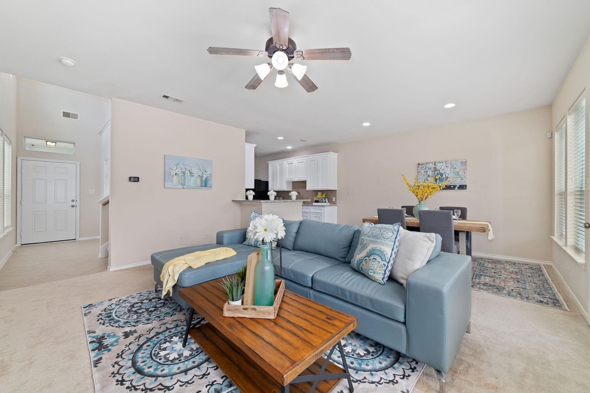 14923 Tuttle Point Drive Houston, TX 77082 - Photo 7 of 24 a living room with furniture and a chandelier