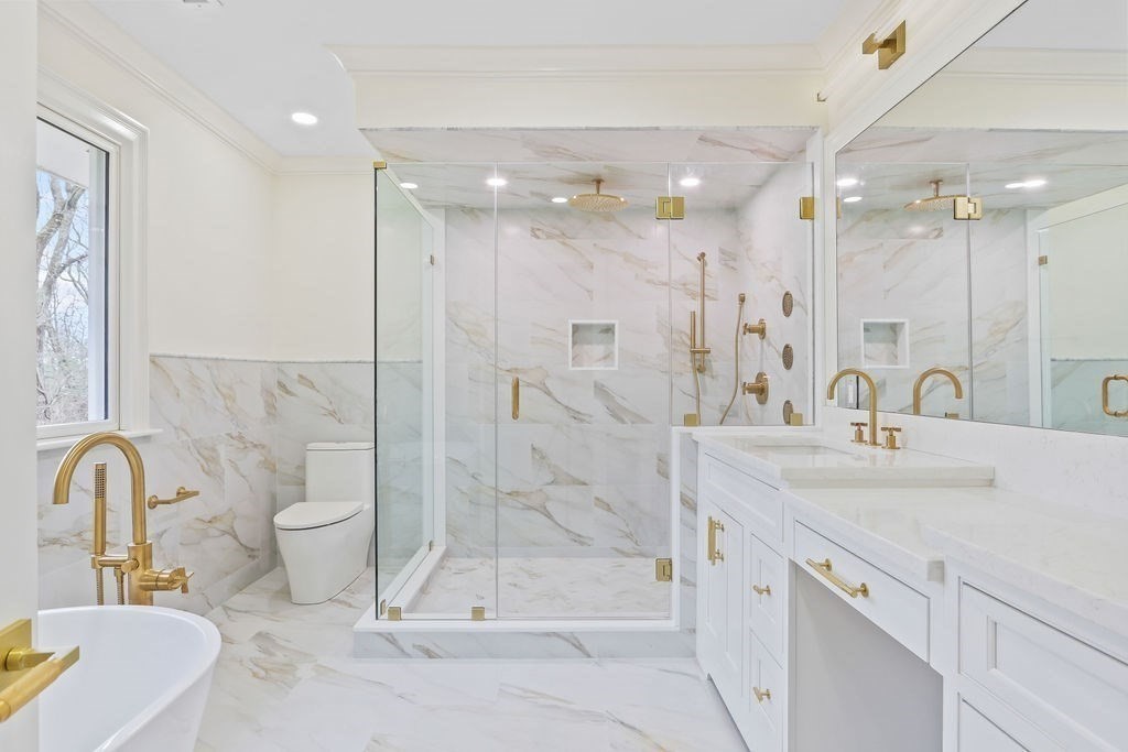 80 Doublet Hill Road Weston, MA 02493 - Photo 25 of 38 a bathroom with a double vanity sink mirror and shower