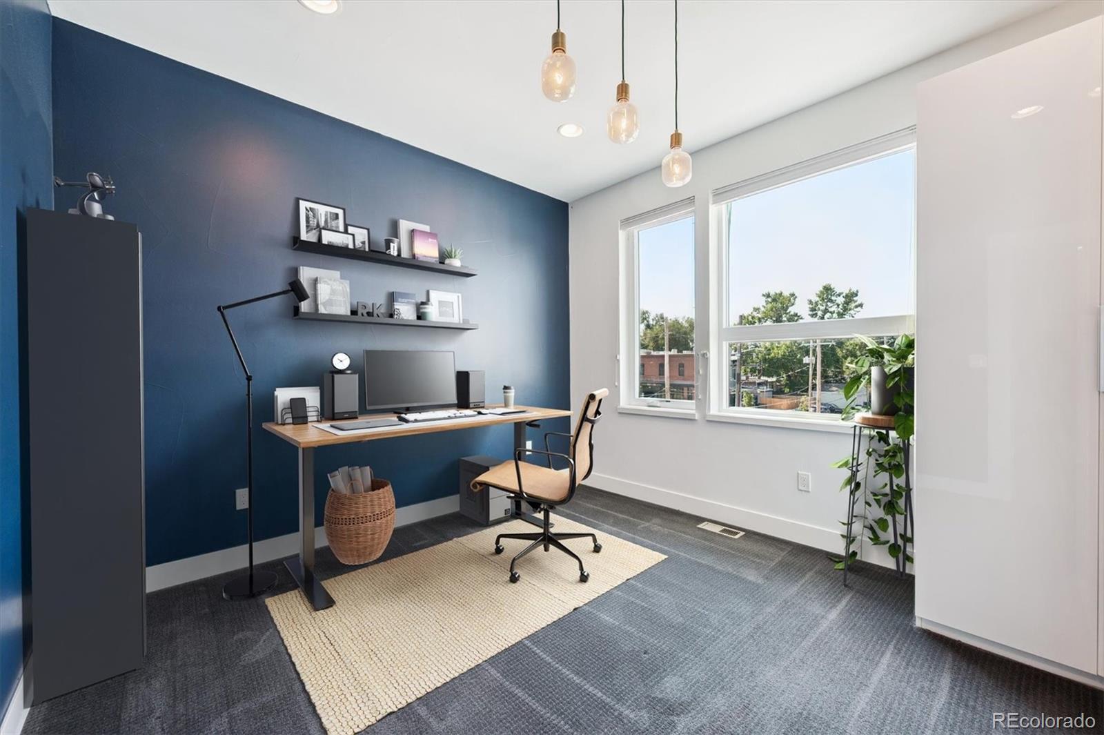3124 Gilpin Street Denver, CO 80205 - Photo 19 of 46 a workspace with furniture window and outside view