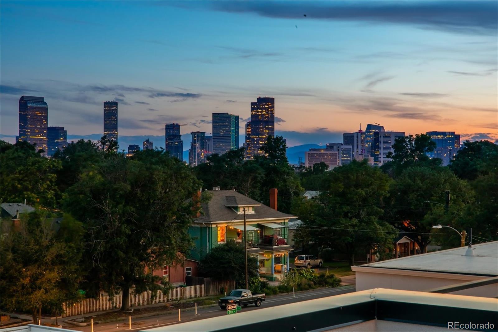 3124 Gilpin Street Denver, CO 80205 - Photo 2 of 46 an aerial view of multiple houses
