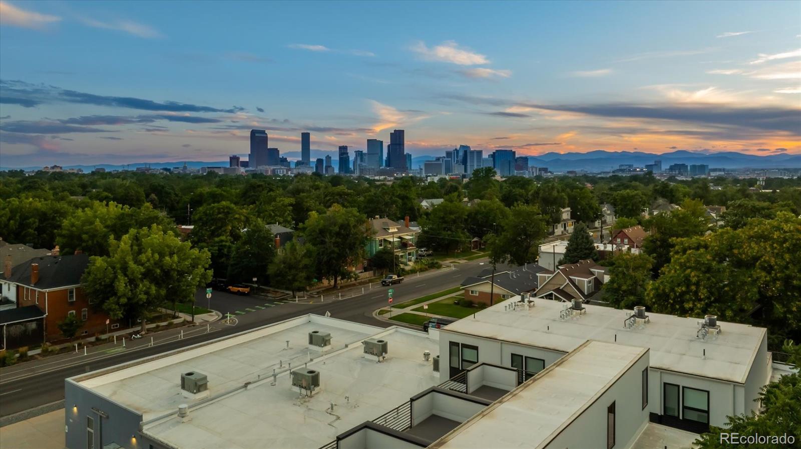 3124 Gilpin Street Denver, CO 80205 - Photo 25 of 46 an aerial view of a house with a yard