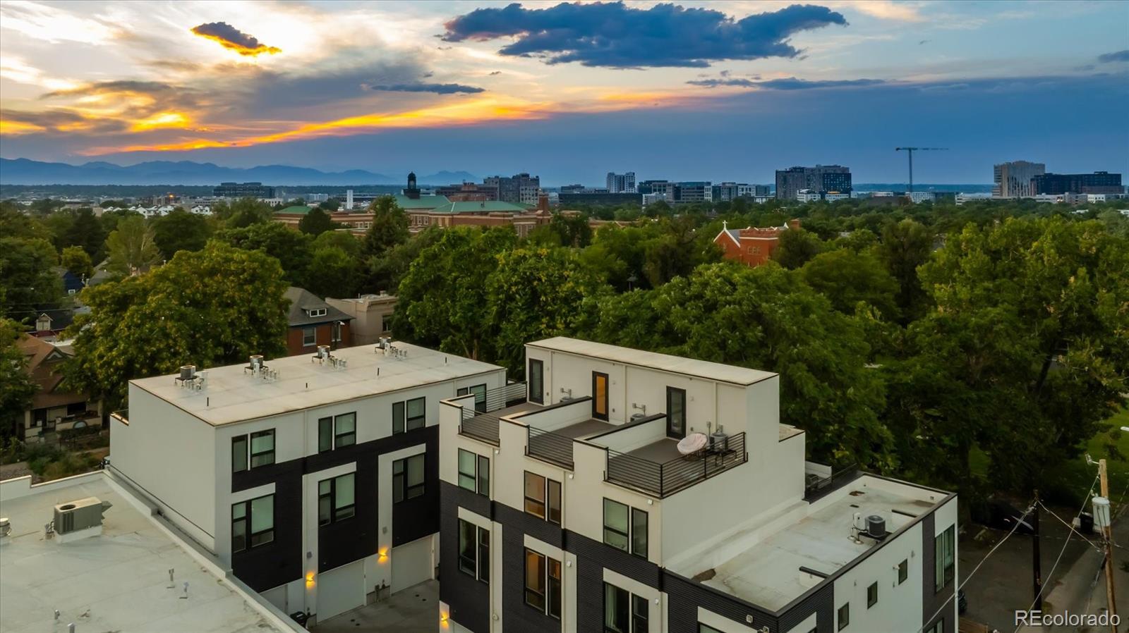 3124 Gilpin Street Denver, CO 80205 - Photo 27 of 46 a view of a terrace with a city view