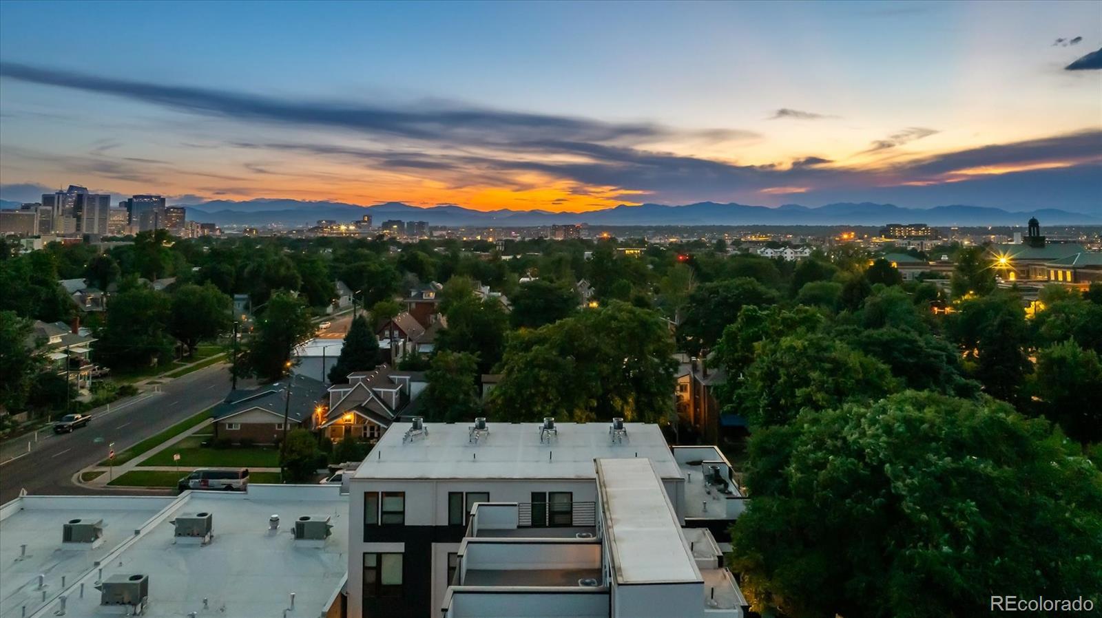 3124 Gilpin Street Denver, CO 80205 - Photo 33 of 46 a view of a city with sunset view