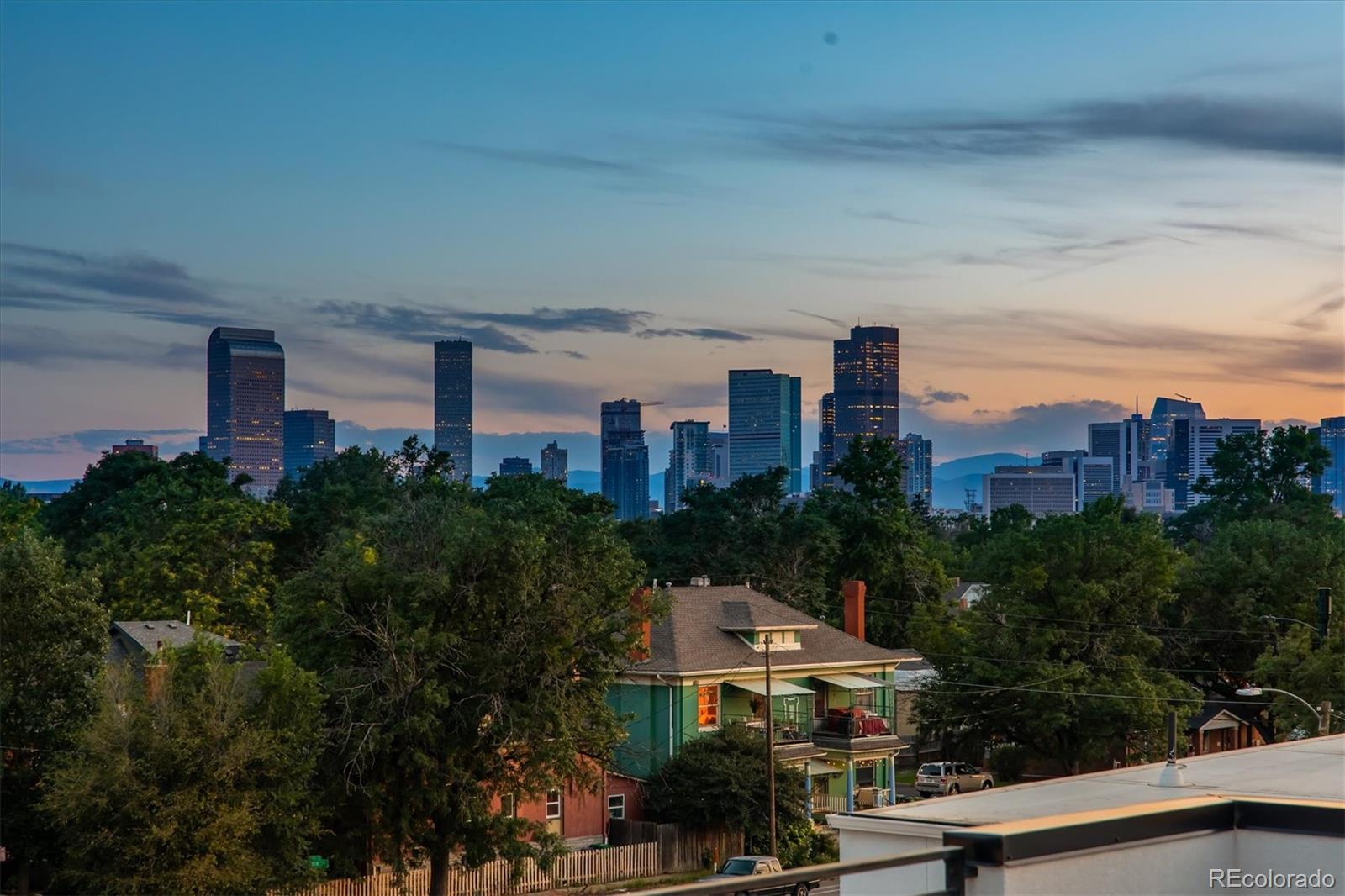 3124 Gilpin Street Denver, CO 80205 - Photo 38 of 46 a view of city with tall buildings