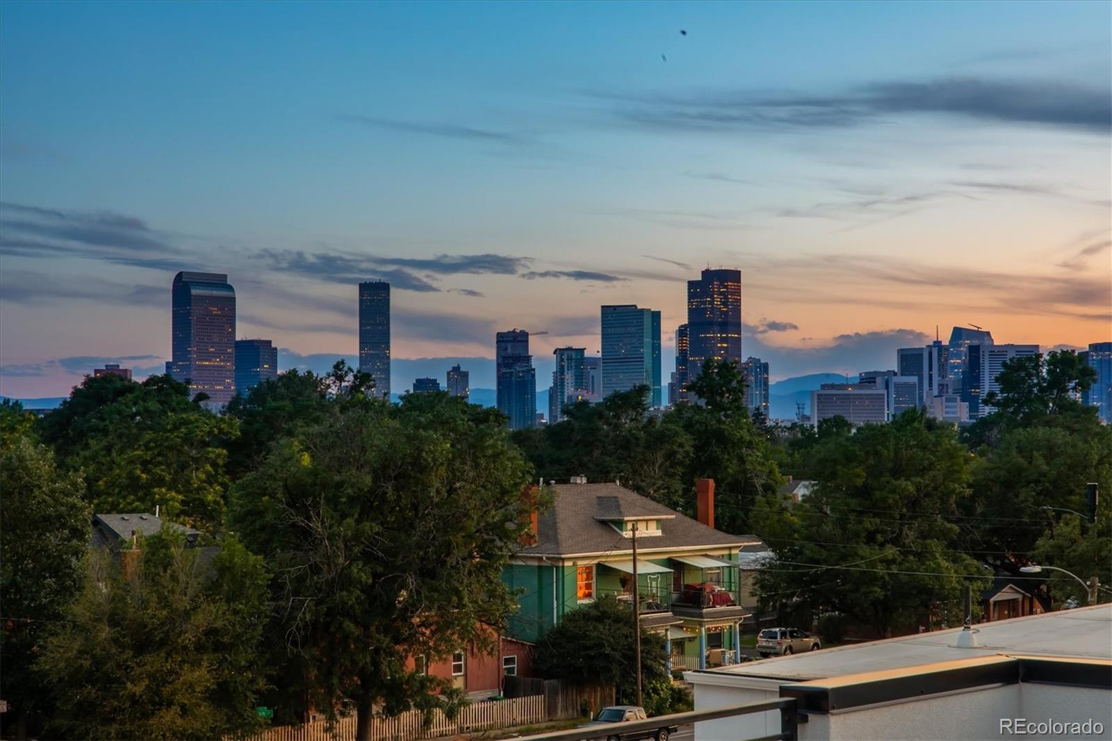 3124 Gilpin Street Denver, CO 80205 - Photo 39 of 46 a view of city with tall buildings
