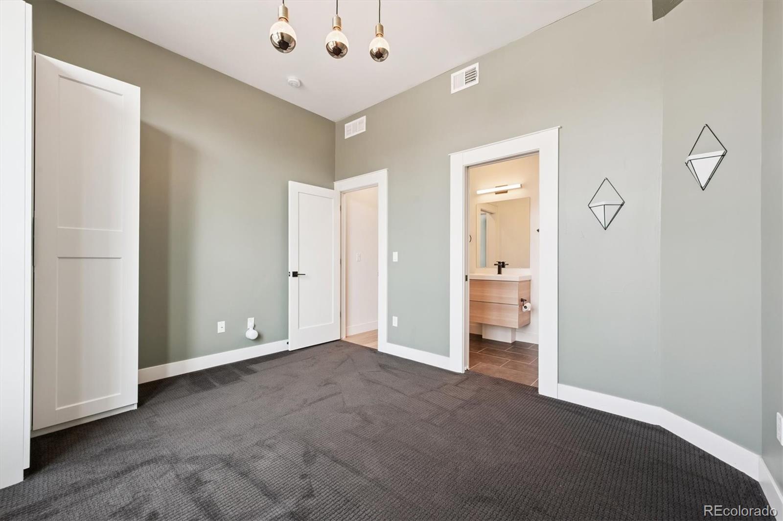 3124 Gilpin Street Denver, CO 80205 - Photo 9 of 46 a view of an empty room with a gallery