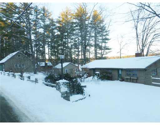 884 Quaker Ridge Road Casco, ME 04015 - Photo 1 of 7 Exterior Front. Lakeside home with...