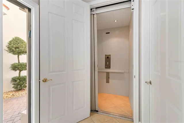 a large kitchen with stainless steel appliances lots of counter space and a sink