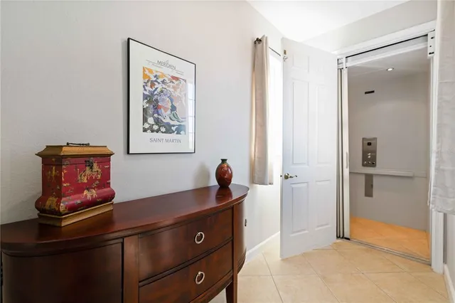 a kitchen with appliances a sink and a refrigerator