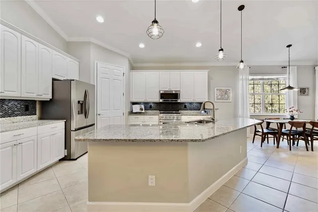 a bathroom with double sink and a mirror