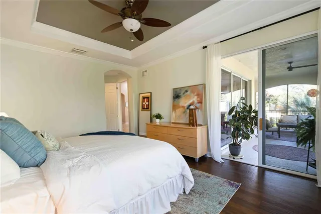 an aerial view of residential houses with outdoor space and swimming pool