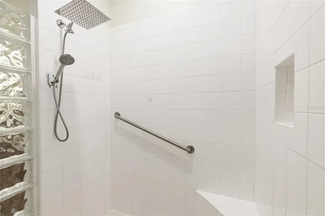 an aerial view of residential houses with yard