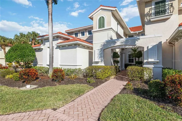 a front view of a house with a glass door
